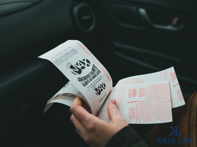 holding lottery tickets in car holding lottery tickets in car