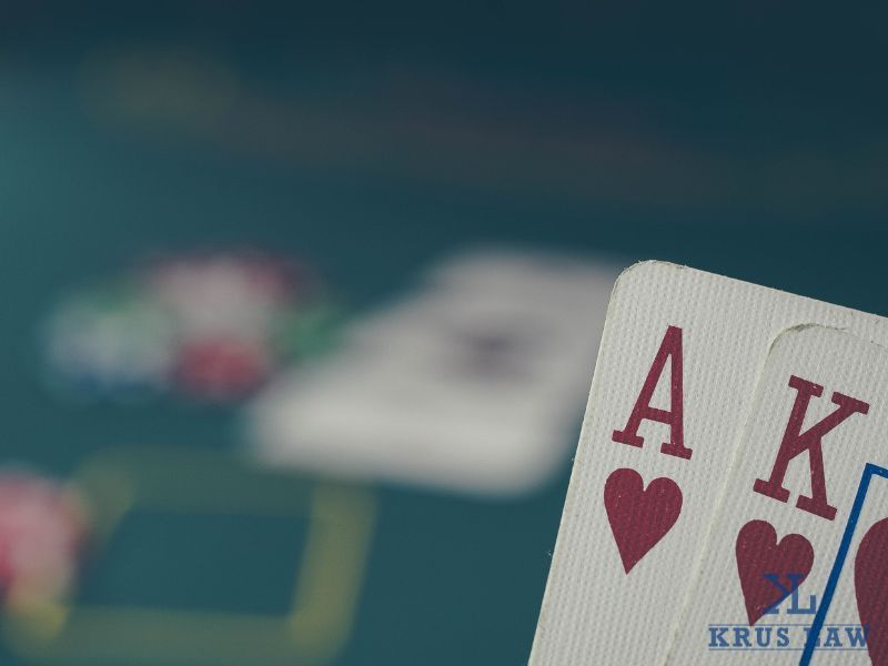 showing an Ace and King to the camera during poker game showing an Ace and King to the camera during poker game