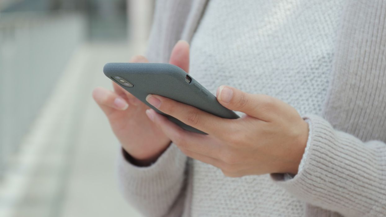 woman using smartphone