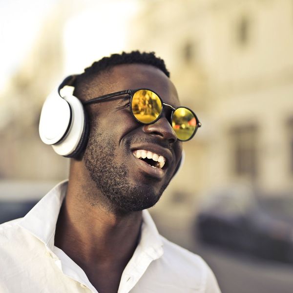 Man with headphones smiling
