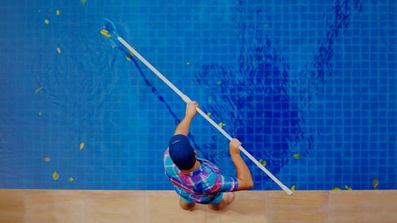 A pool being cleaned.