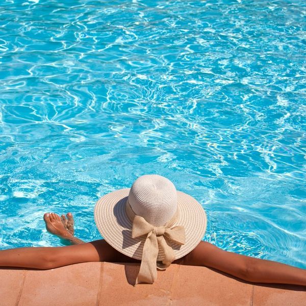 a woman relaxing in her pool