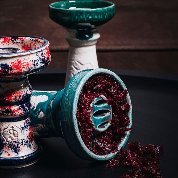 Ceramic hookah bowls filled with tobacco molasses