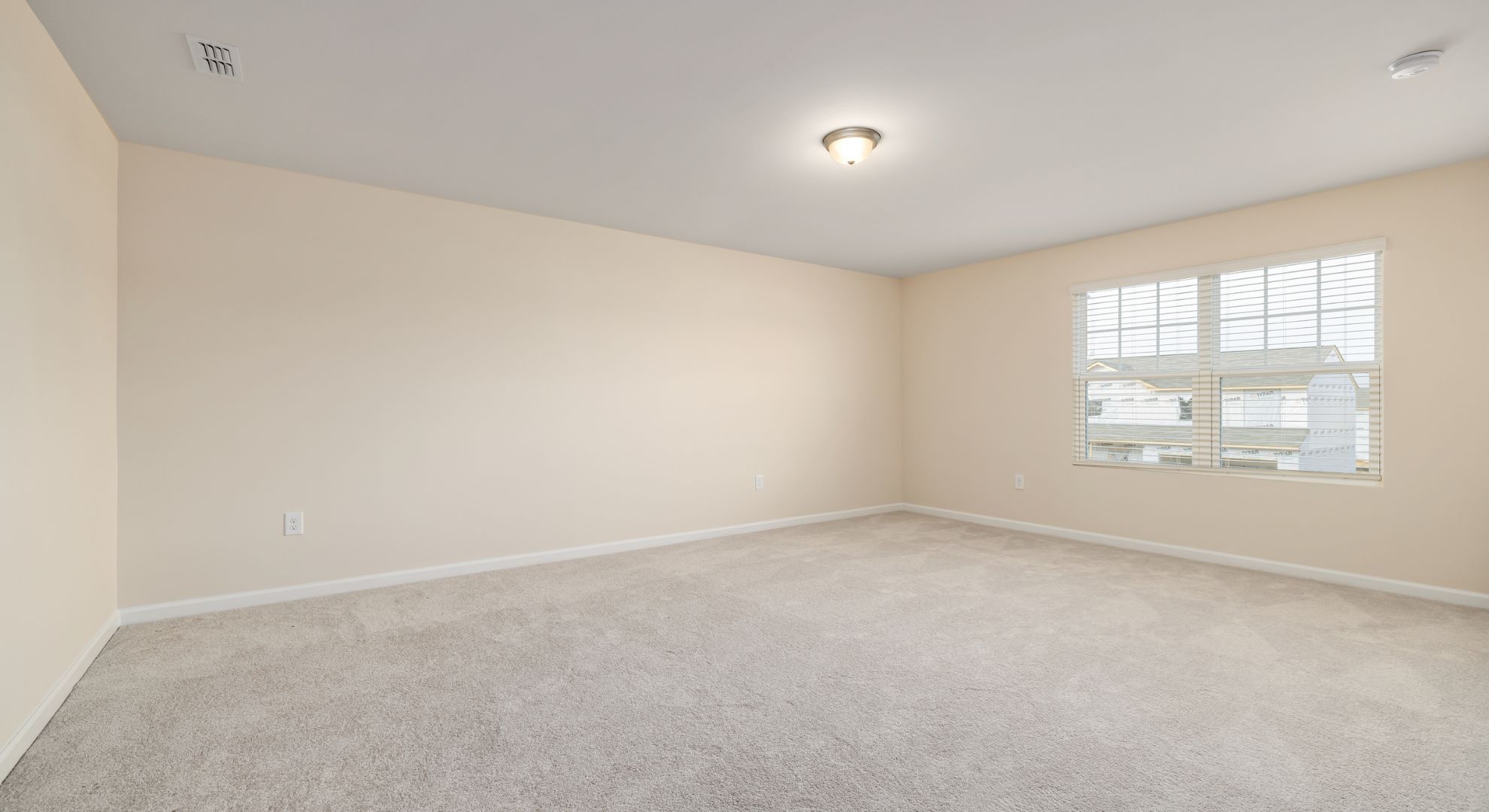 empty carpeted room empty carpeted room