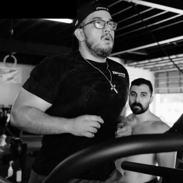 a trainer and a man running about 2.jpg