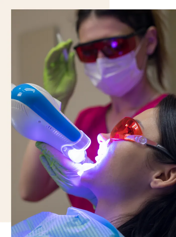 Image of dentist with a patient