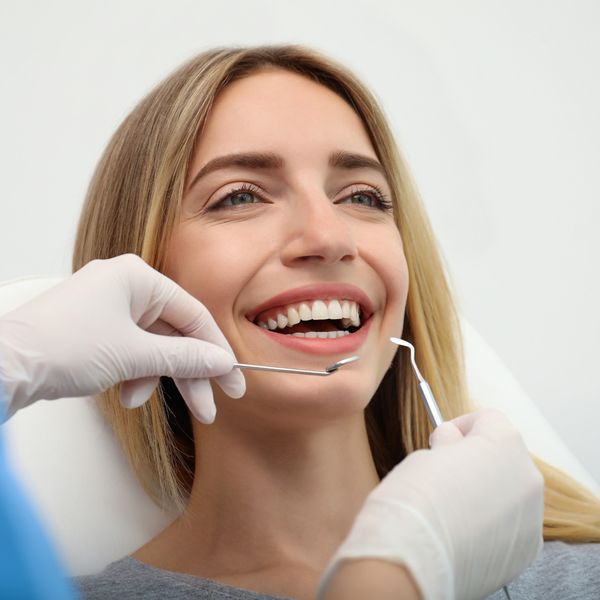 image of a man getting dental work