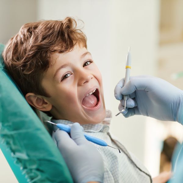 image of a kid at a dental check up