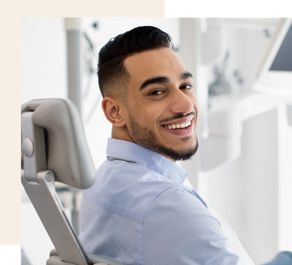 man smiling in dental chair