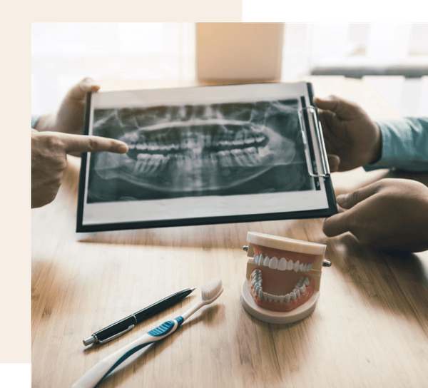 Image of dentist with a patient