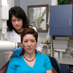 Image of dentist with a patient