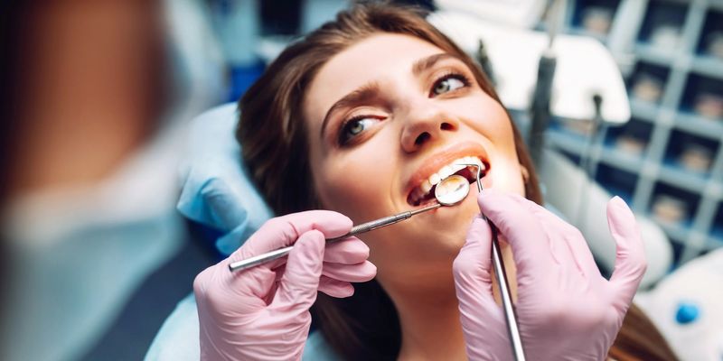 image of a woman getting dental work