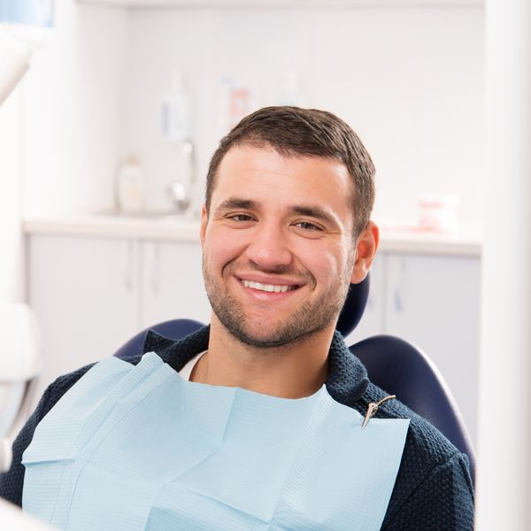 image of a man getting dental work