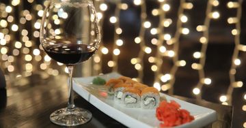 sushi and wine dinner setting 