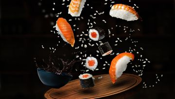 Tossing sushi in the air
