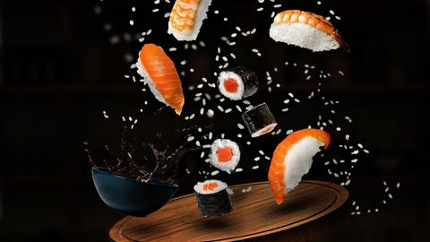 Tossing sushi in the air