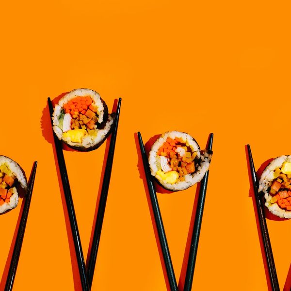 sushi in chopsticks