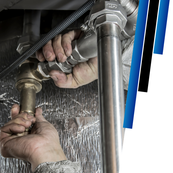 working on plumbing pipes