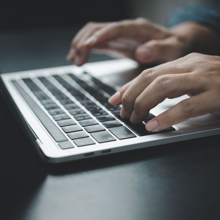person using a laptop person using a laptop