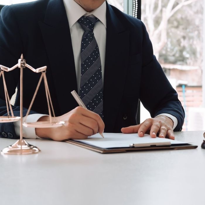 lawyer completing paperwork