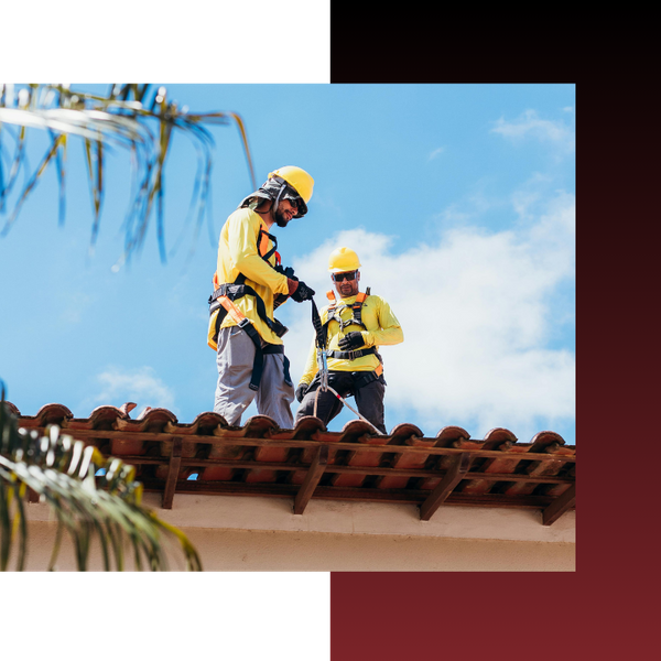roofer standing on top of roof