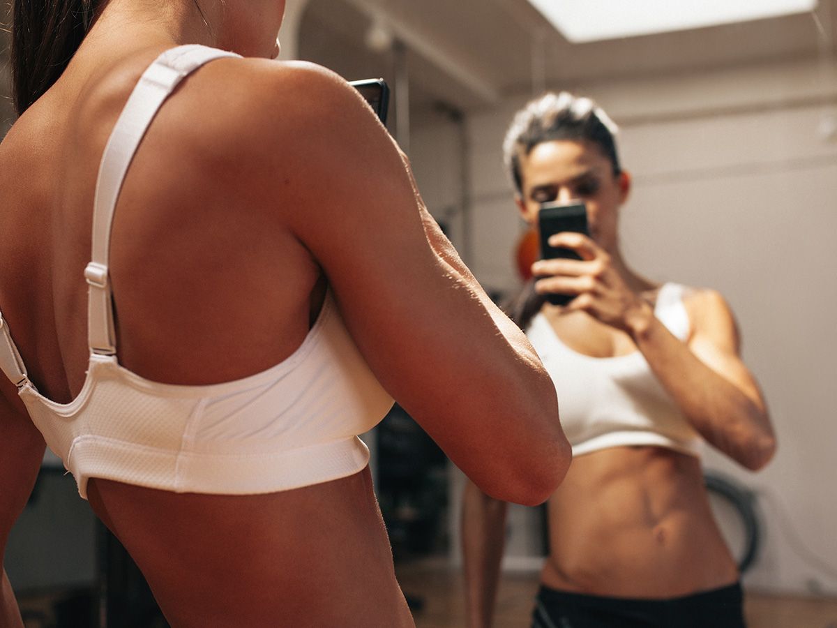 Image of a girl taking a selfie of her body