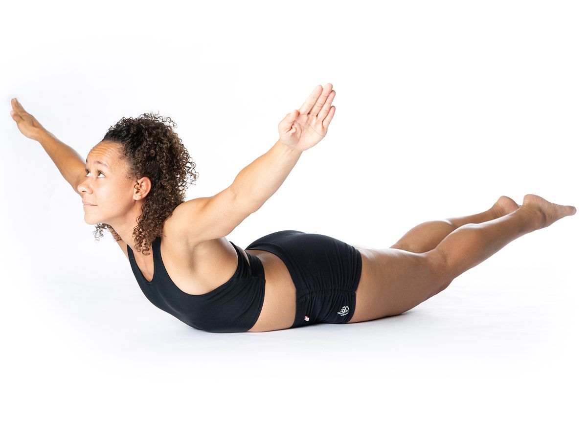 A woman stretching her back