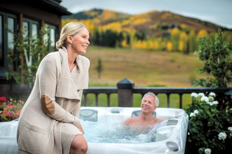 older couple enjoying a hot tub