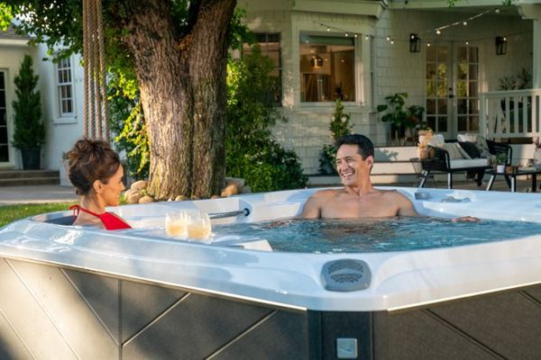 Two people enjoying a hot tub