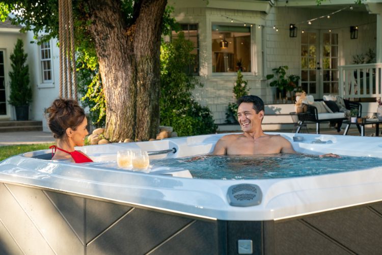 Two people enjoying a hot tub