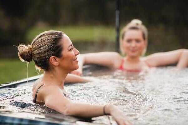 two women in hot tub