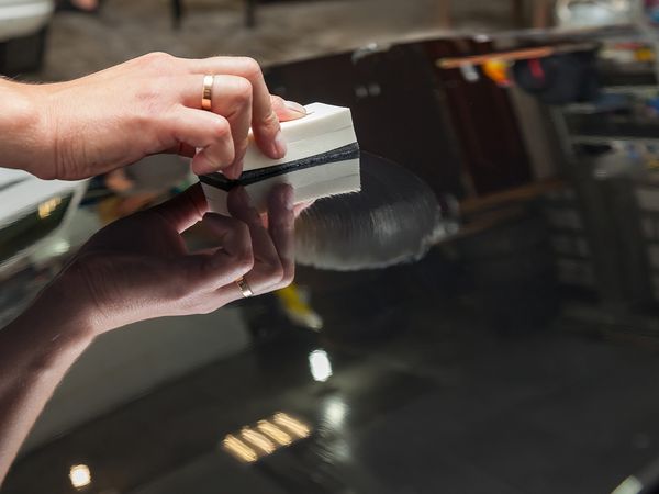 applying ceramic coating to a car hood