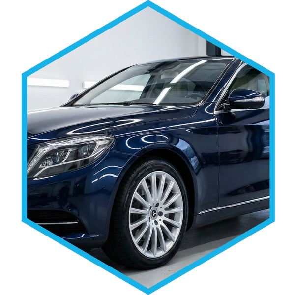 Flawlessly detailed luxury vehicle in a clean studio, ready for winter