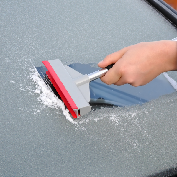 Frost being removed from a car window