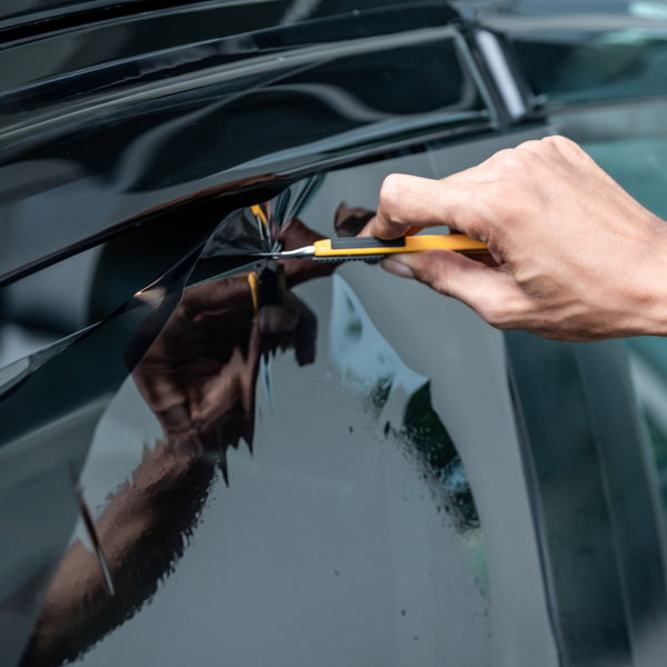 Auto tint being cut to size