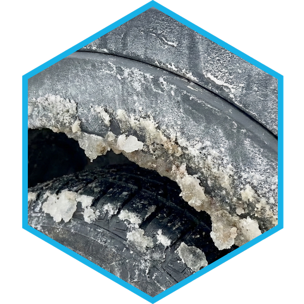 heavy road salt buildup, ice, and grime encrusted