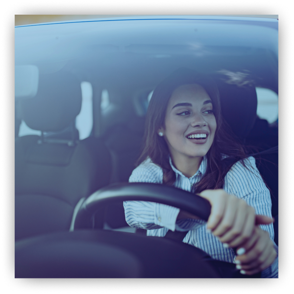 Woman driving a tinted car