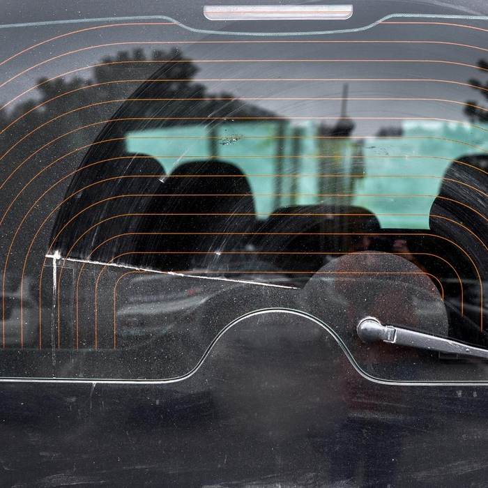 Dirty and scratced rear car window