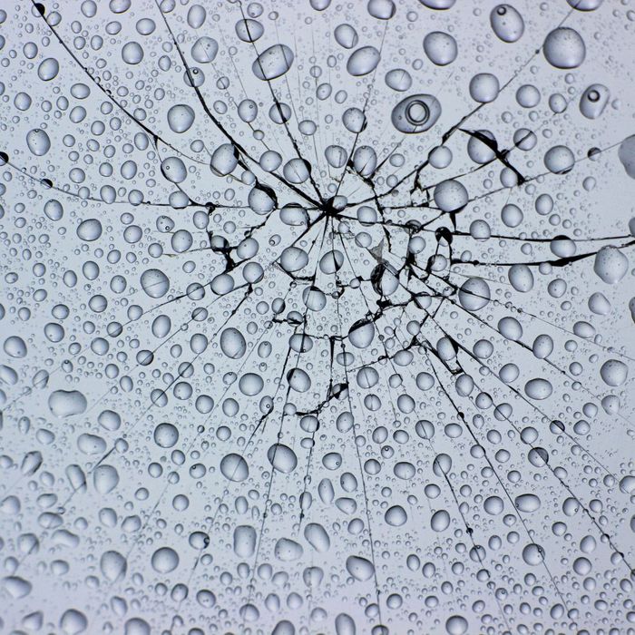 Rain droplets on cracked window