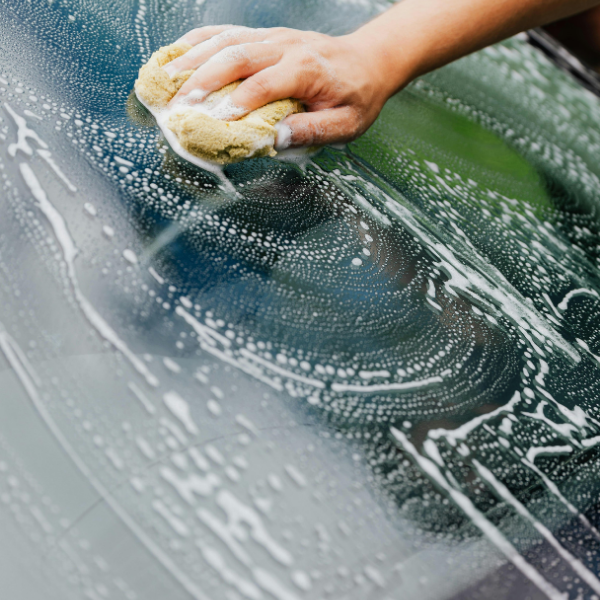 scrubbing new auto glass