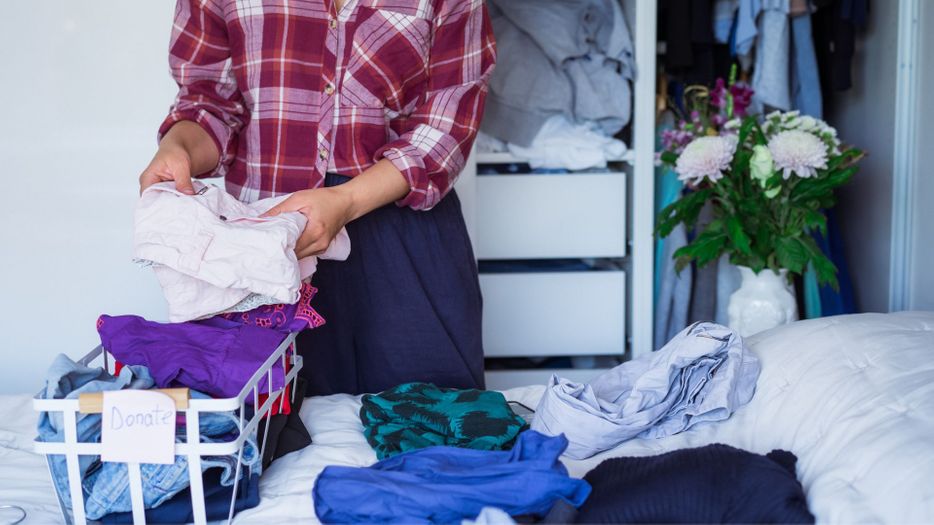 Woman donating clothes 