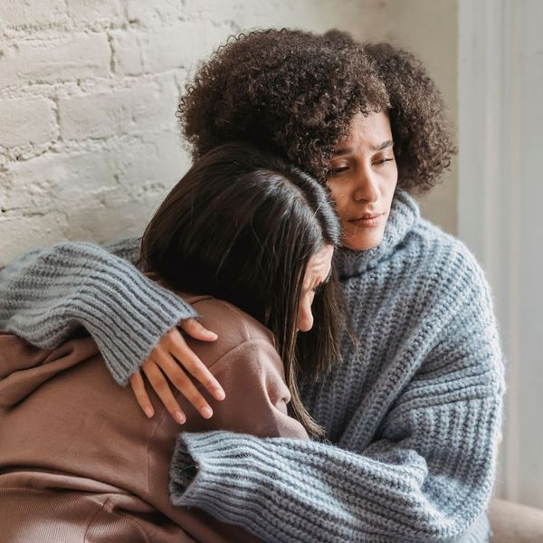 a woman comforting another woman Breaking the Cycle (4).jpg