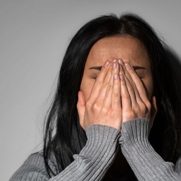 a woman in pain Breaking the Cycle.jpg