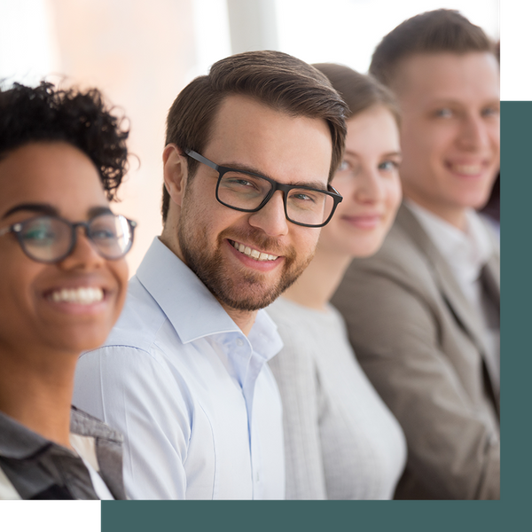 group of employees smiling