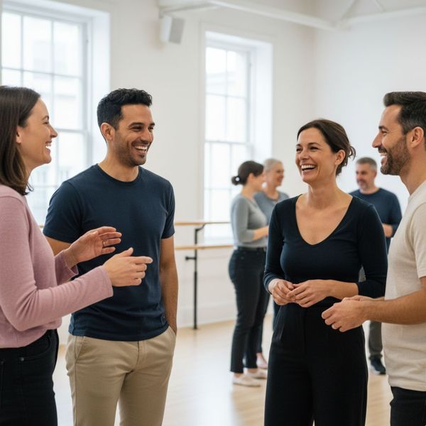 adults chatting and laughing at a dance studio