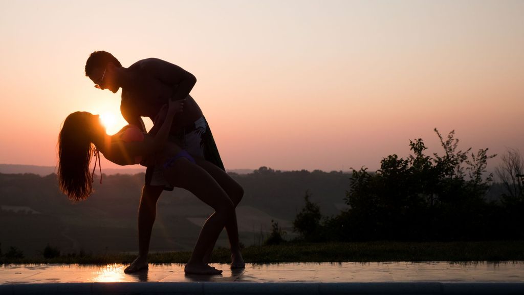 couple dancing at sunset