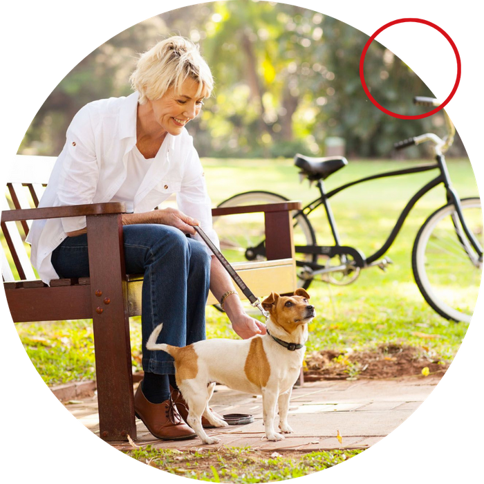 woman at dog park with her dog