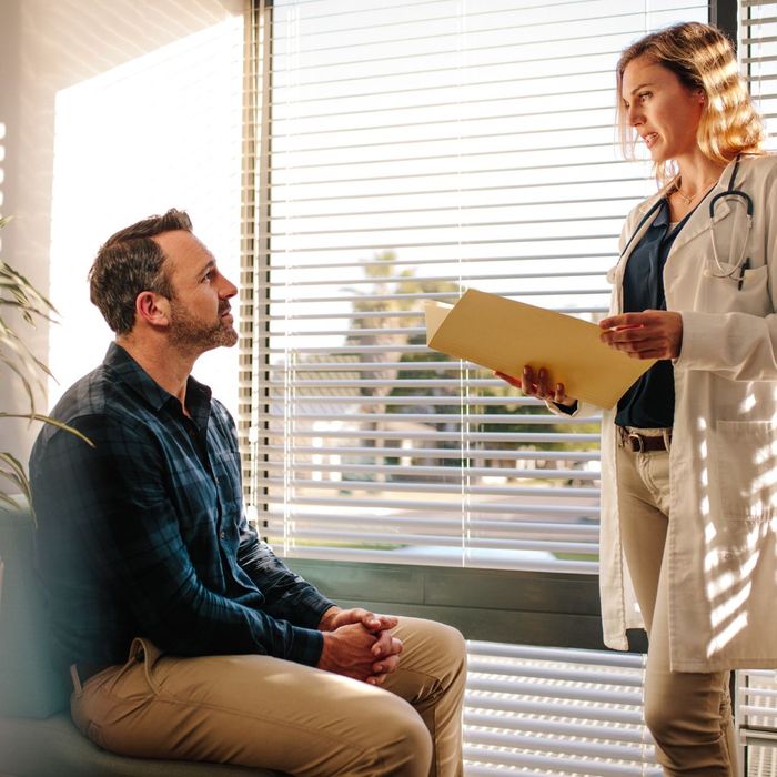 doctor talking with patient