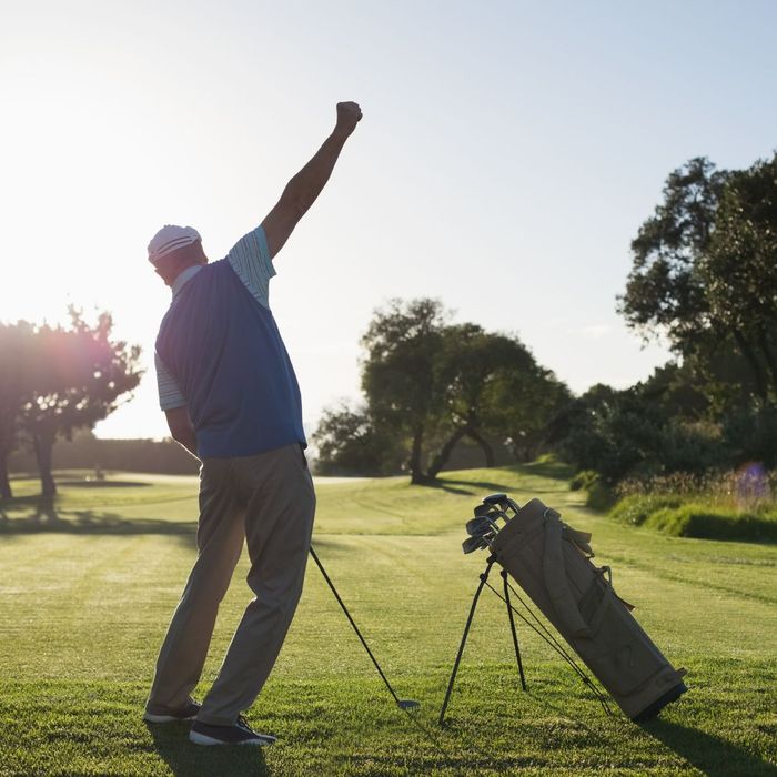 happy man golfing