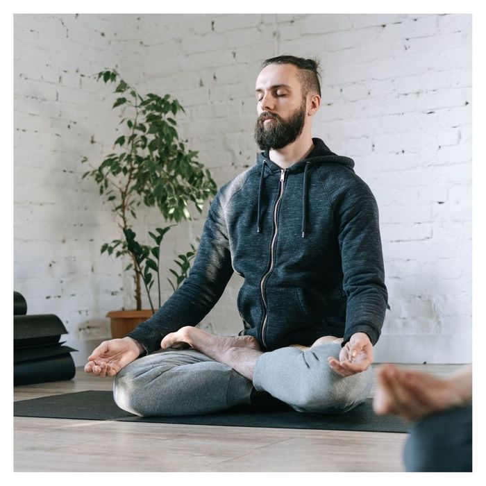 man doing yoga